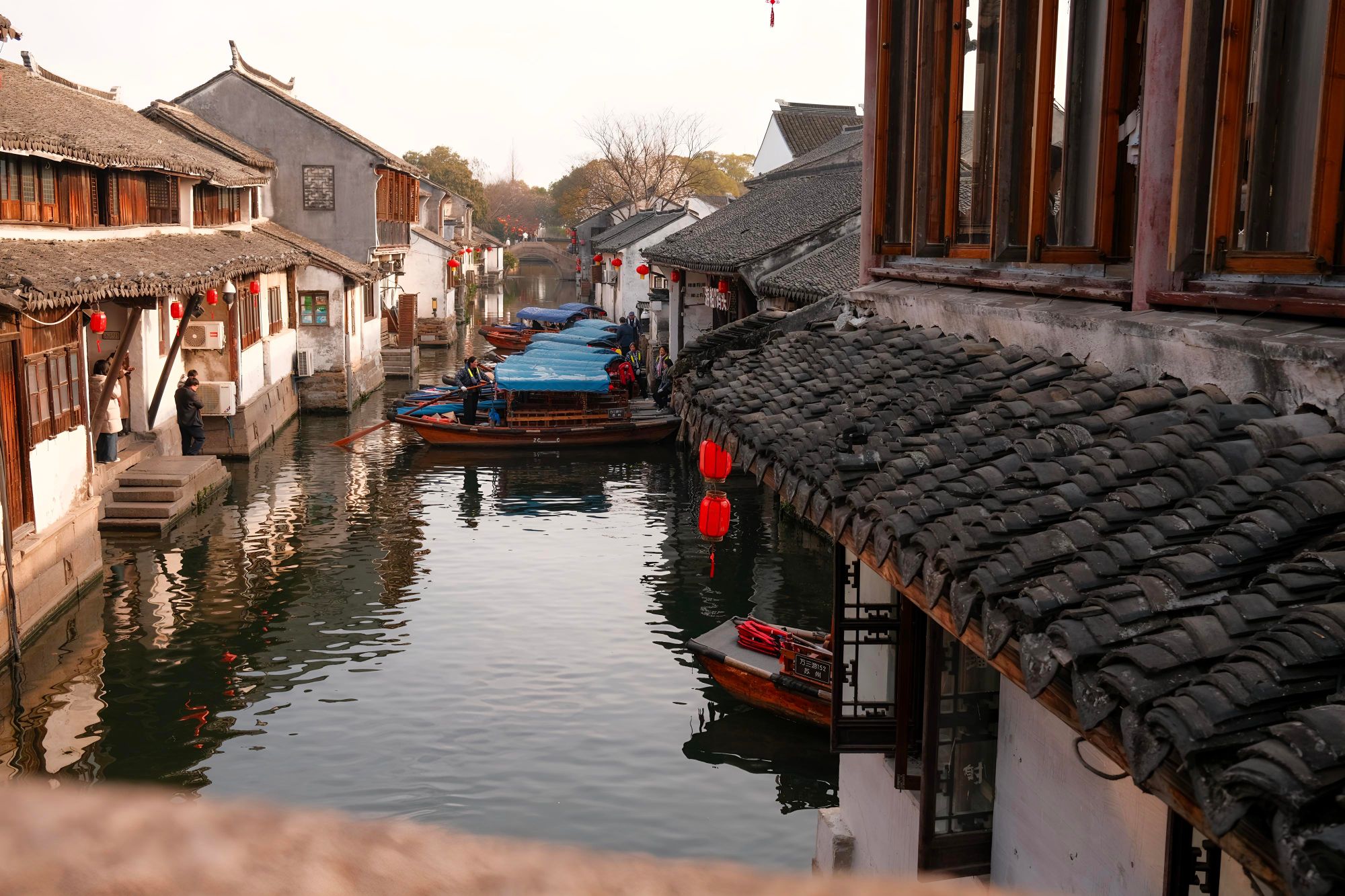 A historic canal lined with traditional houses in Suzhou